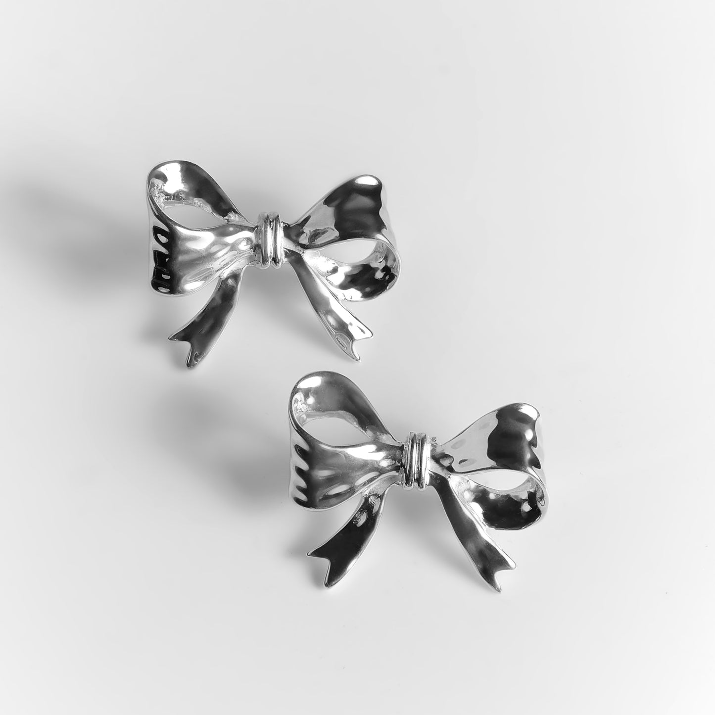 Earrings BOWS platinum